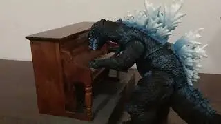 Godzilla playing the piano