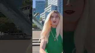 Crossdresser Anastasia Harris Walks in Downtown Vancouver Wearing Green Dress and High Heels