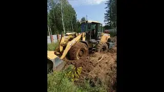 STUCK IN THE MUD ON THE SITE/A COLLEAGUE PULLED IT OUT.