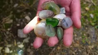 A real shot of a large emerald and sapphire excavation site. agate