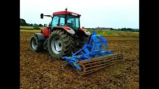Preparing a field for sowing winter wheat with a Lemken compactor. Leveling the field.