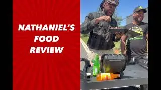 Nathaniel tries food from Crav’n Caribbean
