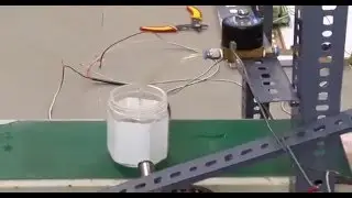 Automatic bottle filling Plant using PLC and remote monitoring through SCADA