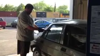 My buddy tries to break car window with hammer