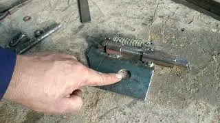 Door hinges from a square and a homemade strong latch for the door.