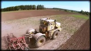 Кировец К-700А с самодельным культиватором