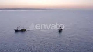 Fishing Trawlers at Sunrise Seen From the Air | Stock Footage - Envato elements