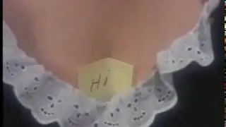 Yellow Post-It HI from the center of a chest