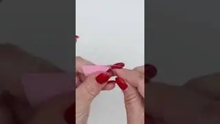 Thread eye of needle with 1” square of paper