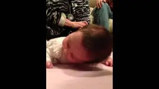 Rylie tries to crawl.