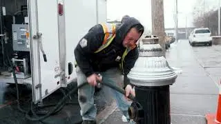 Defrosting fire hydrants during cold weather in Brooklyn