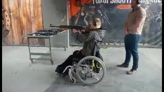 Mees ratastoolis laseb relvast Vepr .308 - Ghost Tactics - Margus Ojaküla - 2021