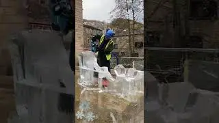 live carving of ice sculpture santa sleigh