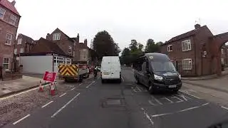Left hook on cyclist with kid in back chair. Ridiculous