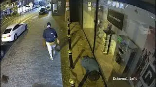 Callous thief steals homeless man's guitar while he sleeps in a shop doorway