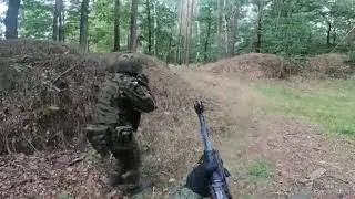 Airsoft game with friends in a polish forest