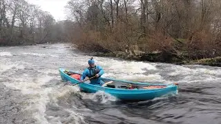Surfing a Canoe:  how to surf a river wave.