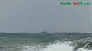 Fishing Boat Sailing on a Stormy Ocean