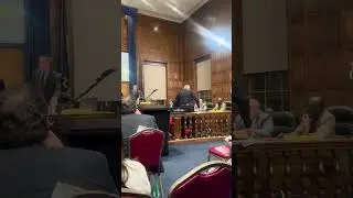 Protester refuses to leave council dais