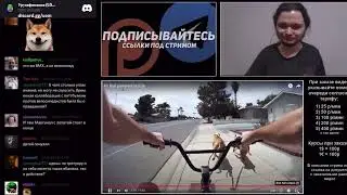 Маргинал смотрит как два питбуля тянут велосипедиста