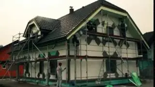 Мокрая штукатурка современного фасада