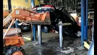 Honda Accord falls off lift#4