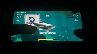 Играю в игру Hungry shark evolution. Забираю свои награды.