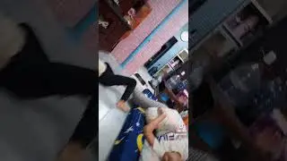 Naifa tidur bersama kucing kesayangan