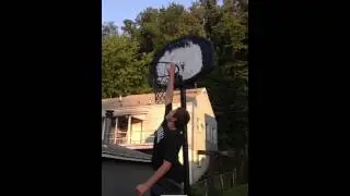 14 year old touches 9 feet 5 inches rim