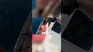Get the POV of a Coast Guardsman during the interdiction of a suspected smuggling vessel