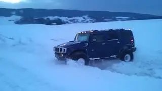 hummer h2 in snow drifting and moving absolutely modified and experienced truck