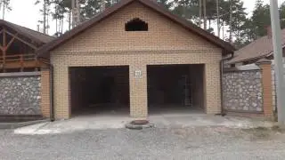 секционные ворота алютех