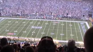 Raising the 12th Man flag, kicking off the 2014 NFL season