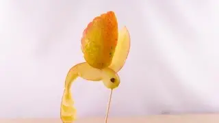 Сarving colibri from apple