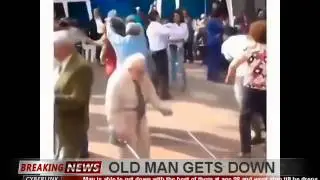 Old man gets down on floor with canes dancing to hip-hop