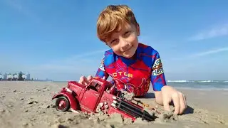 The story of how Leo found a toy fire truck in the sand on the beach
