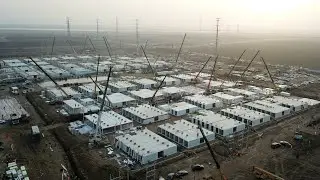 China: Thousands of residents of more than 100 buildings  are taken to COVID isolation camps.