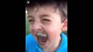 A kid scared of a frog