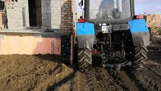 Обратная отсыпка и трамбовка трактором.