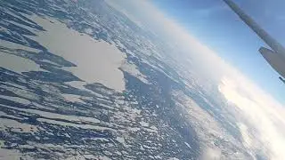Beautiful view from flight dual tone concave lens window