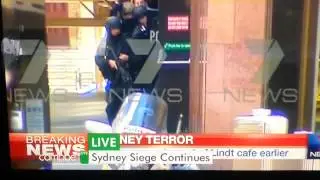 Terrorist hold hostages at gunpoint in Sydney 2014
