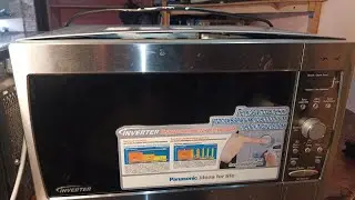 Свч Panasonic .   Не открывается дверца !