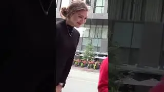 How do strangers react to a tall girl? 