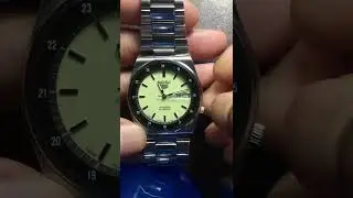 Seiko 5 transparent glass back automatic watch.
