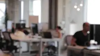 Smart Hub Blurry People Working