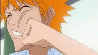 Tatsuki punches Ichigo