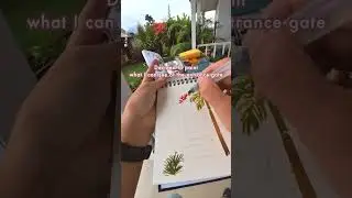 Painting an entrance gate in Bali on a rainy day