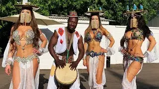 Beautiful oriental dance in white masks