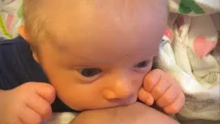 Breastfeeding newborn twins, two days old (how to demo).
