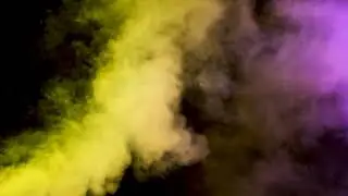 Beautiful Colorful Abstract Smoke Clouds Over a Black Background Video